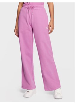 Calvin Klein Jeans Spodnie dresowe J20J220261 Różowy Relaxed Fit ze sklepu MODIVO w kategorii Spodnie damskie - zdjęcie 168623007