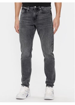 Calvin Klein Jeans Jeansy J30J324196 Szary Slim Taper Fit ze sklepu MODIVO w kategorii Jeansy męskie - zdjęcie 168623688