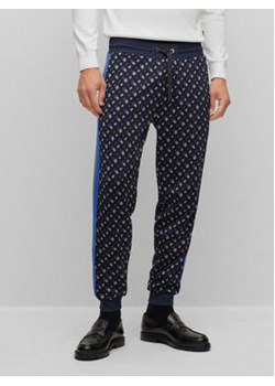 Boss Spodnie dresowe 50486273 Granatowy Regular Fit ze sklepu MODIVO w kategorii Spodnie męskie - zdjęcie 168626628
