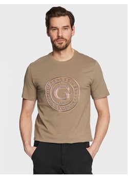 Guess T-Shirt Round Logo M3GI11 J1314 Zielony Slim Fit ze sklepu MODIVO w kategorii T-shirty męskie - zdjęcie 168626635