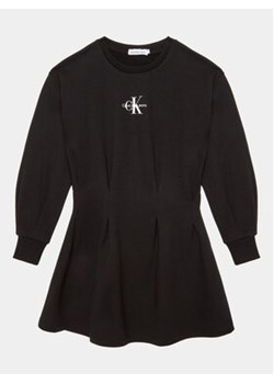 Calvin Klein Jeans Sukienka dzianinowa Gradient Monogram IG0IG02047 Czarny Regular Fit ze sklepu MODIVO w kategorii Sukienki dziewczęce - zdjęcie 168627536