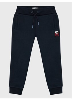 Tommy Hilfiger Spodnie dresowe Monogram KS0KS00297 Granatowy Regular Fit ze sklepu MODIVO w kategorii Spodnie chłopięce - zdjęcie 168632339