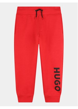 Hugo Spodnie dresowe G24128 D Czerwony Regular Fit ze sklepu MODIVO w kategorii Spodnie chłopięce - zdjęcie 168634018