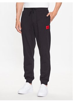 Hugo Spodnie dresowe Logo 50490270 Czarny Regular Fit ze sklepu MODIVO w kategorii Spodnie męskie - zdjęcie 168635266
