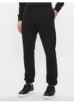 Pepe Jeans Spodnie dresowe Joe Jogger PM211645 Czarny Regular Fit ze sklepu MODIVO w kategorii Spodnie męskie - zdjęcie 168637467
