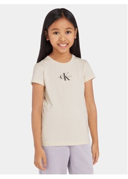 Calvin Klein Jeans T-Shirt Mico Monogram IG0IG01470 Beżowy Slim Fit ze sklepu MODIVO w kategorii Bluzki dziewczęce - zdjęcie 168637827