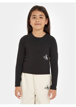 Calvin Klein Jeans Bluzka Monogram Off Placed IG0IG02104 Czarny Slim Fit ze sklepu MODIVO w kategorii Bluzki dziewczęce - zdjęcie 168641117
