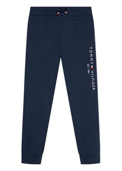 Tommy Hilfiger Spodnie dresowe Essential KS0KS00214 Granatowy Regular Fit ze sklepu MODIVO w kategorii Spodnie chłopięce - zdjęcie 168648139
