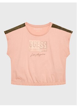 Guess T-Shirt J3GI11 K8HM3 Różowy Boxy Fit ze sklepu MODIVO w kategorii Bluzki dziewczęce - zdjęcie 168656389
