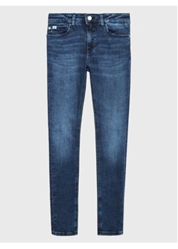 Calvin Klein Jeans Jeansy IG0IG01887 Niebieski Skinny Fit ze sklepu MODIVO w kategorii Spodnie dziewczęce - zdjęcie 168656685