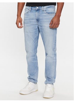 Calvin Klein Jeans Jeansy J30J324190 Niebieski Slim Fit ze sklepu MODIVO w kategorii Jeansy męskie - zdjęcie 168660585
