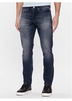 Calvin Klein Jeans Jeansy J30J324189 Granatowy Slim Fit ze sklepu MODIVO w kategorii Jeansy męskie - zdjęcie 168661417