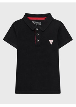 Guess Polo N2GP03 KAPY0 Czarny Regular Fit ze sklepu MODIVO w kategorii T-shirty chłopięce - zdjęcie 168663036