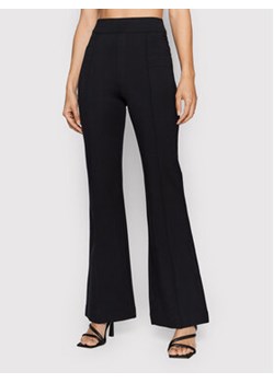 SPANX Spodnie materiałowe The Perfect 20252R Czarny Flare Fit ze sklepu MODIVO w kategorii Spodnie damskie - zdjęcie 168664855