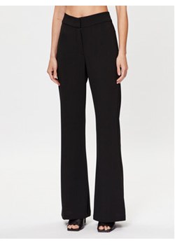 DKNY Spodnie materiałowe P2RKAO19 Czarny Flare Fit ze sklepu MODIVO w kategorii Spodnie damskie - zdjęcie 168665695