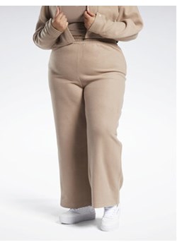 Reebok Spodnie dresowe Reebok Classics Reverse Fleece Wide Leg Joggers (Plus Size) IB4453 Brązowy ze sklepu MODIVO w kategorii Spodnie damskie - zdjęcie 168666178