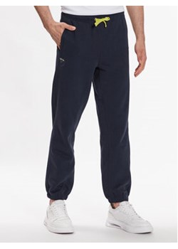Blauer Spodnie dresowe 23SBLUF07089 005662 Granatowy Relaxed Fit ze sklepu MODIVO w kategorii Spodnie męskie - zdjęcie 168678176