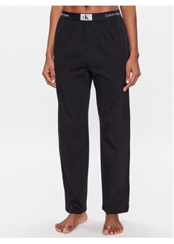 Calvin Klein Underwear Spodnie piżamowe 000QS6948E Czarny Relaxed Fit ze sklepu MODIVO w kategorii Piżamy damskie - zdjęcie 168680075