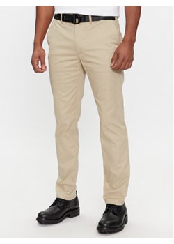 Calvin Klein Chinosy Modern K10K110979 Beżowy Slim Fit ze sklepu MODIVO w kategorii Spodnie męskie - zdjęcie 168683399