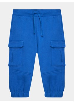 United Colors Of Benetton Spodnie dresowe 3J68GF034 Niebieski Regular Fit ze sklepu MODIVO w kategorii Spodnie chłopięce - zdjęcie 168692125