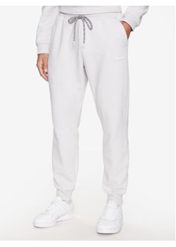 Columbia Spodnie dresowe Marble Canyon™ Heavyweight Fleece Pant Szary Regular Fit ze sklepu MODIVO w kategorii Spodnie męskie - zdjęcie 168693917