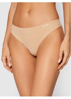 Calvin Klein Underwear Stringi 0000D3428E Beżowy ze sklepu MODIVO w kategorii Majtki damskie - zdjęcie 168694489
