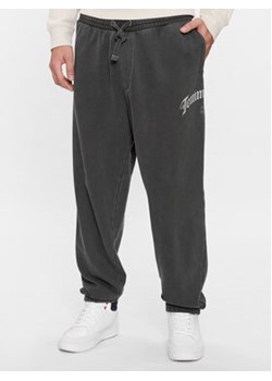 Tommy Jeans Spodnie dresowe DM0DM17696 Czarny Baggy Fit ze sklepu MODIVO w kategorii Spodnie męskie - zdjęcie 168695846