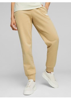 Puma Spodnie dresowe &quot;ESS&quot; w kolorze beżowym ze sklepu Limango Polska w kategorii Spodnie damskie - zdjęcie 168703885