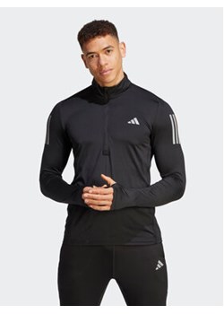 adidas Koszulka techniczna Own the Run IK9562 Czarny Regular Fit ze sklepu MODIVO w kategorii T-shirty męskie - zdjęcie 168746705