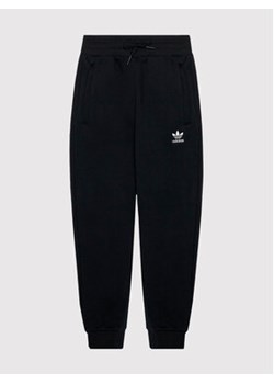 adidas Spodnie dresowe adicolor H32406 Czarny Regular Fit ze sklepu MODIVO w kategorii Spodnie chłopięce - zdjęcie 168754569