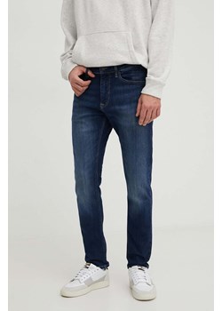 Tommy Jeans jeansy męskie kolor granatowy DM0DM18729 ze sklepu ANSWEAR.com w kategorii Jeansy męskie - zdjęcie 168775269