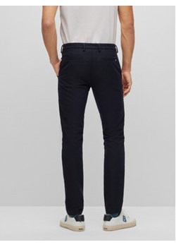 Boss Spodnie materiałowe Kaito1_T 50487754 Granatowy Slim Fit ze sklepu MODIVO w kategorii Spodnie męskie - zdjęcie 168789466