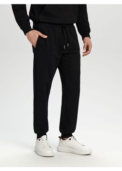 Sinsay - Spodnie dresowe - czarny ze sklepu Sinsay w kategorii Spodnie męskie - zdjęcie 168798417