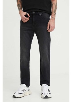 HUGO jeansy męskie kolor czarny 50507857 ze sklepu ANSWEAR.com w kategorii Jeansy męskie - zdjęcie 168813215
