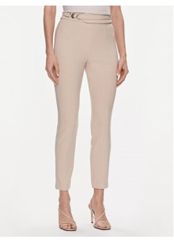 Marciano Guess Spodnie materiałowe Karen 4RGB02 6869Z Beżowy Slim Fit ze sklepu MODIVO w kategorii Spodnie damskie - zdjęcie 168827549