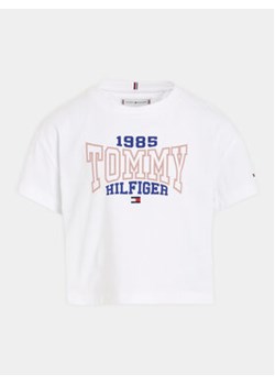 Tommy Hilfiger T-Shirt 1985 KG0KG07441 D Biały Regular Fit ze sklepu MODIVO w kategorii Bluzki dziewczęce - zdjęcie 168839635