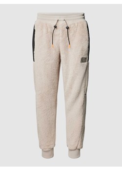 Spodnie dresowe z futerkiem ze sklepu Peek&Cloppenburg  w kategorii Spodnie męskie - zdjęcie 168979899