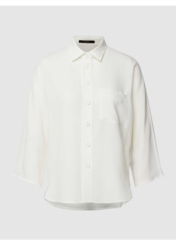 Bluzka w jednolitym kolorze ze sklepu Peek&Cloppenburg  w kategorii Koszule damskie - zdjęcie 168995305