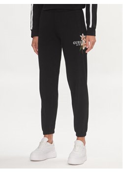 Guess Spodnie dresowe Zoey V4GB04 KC6V1 Czarny Regular Fit ze sklepu MODIVO w kategorii Spodnie damskie - zdjęcie 169015289