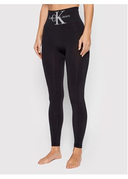 Calvin Klein Jeans Legginsy 701220429 Czarny Slim Fit ze sklepu MODIVO w kategorii Spodnie damskie - zdjęcie 169054685