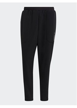 adidas Spodnie dresowe Terrex Multi Primegreen GM4771 Czarny Slim Fit ze sklepu MODIVO w kategorii Spodnie męskie - zdjęcie 169055316