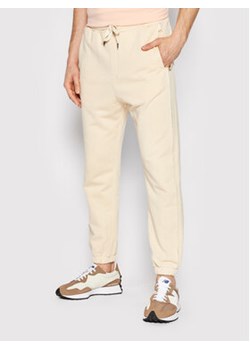 Imperial Spodnie dresowe PD5MDAC Beżowy Regular Fit ze sklepu MODIVO w kategorii Spodnie męskie - zdjęcie 169183636