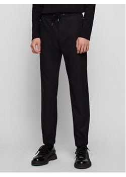Boss Spodnie materiałowe Banks1-Spw-Z 50444546 Czarny Slim Fit ze sklepu MODIVO w kategorii Spodnie męskie - zdjęcie 169187336