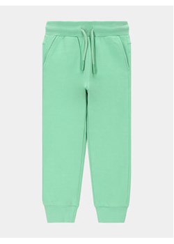 Coccodrillo Spodnie dresowe WC4120102VGA Zielony Regular Fit ze sklepu MODIVO w kategorii Spodnie chłopięce - zdjęcie 169191658