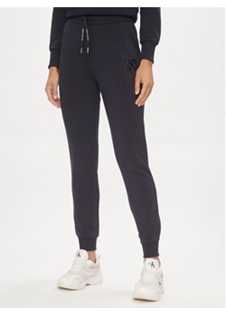 Armani Exchange Spodnie dresowe 3DYP79 YJEPZ 1593 Granatowy Regular Fit ze sklepu MODIVO w kategorii Spodnie damskie - zdjęcie 169204595