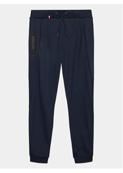 Tommy Hilfiger Spodnie dresowe KS0KS00504 D Granatowy Regular Fit ze sklepu MODIVO w kategorii Spodnie chłopięce - zdjęcie 169232448