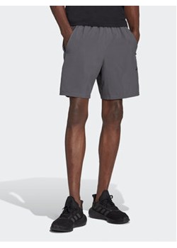 adidas Szorty sportowe Train Essentials Woven Training Shorts IC6978 Szary Regular Fit ze sklepu MODIVO w kategorii Spodenki męskie - zdjęcie 169232995