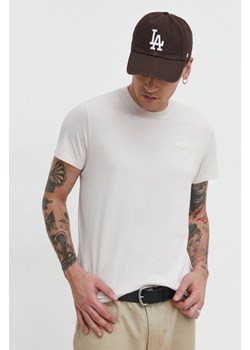 Superdry t-shirt bawełniany męski kolor beżowy gładki ze sklepu ANSWEAR.com w kategorii T-shirty męskie - zdjęcie 169243677