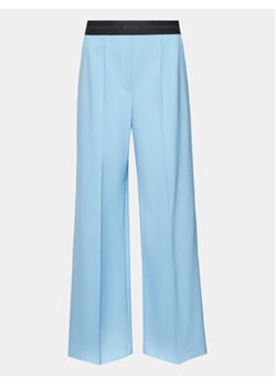 MSGM Spodnie materiałowe 3441MDP16 237200 Niebieski Relaxed Fit ze sklepu MODIVO w kategorii Spodnie damskie - zdjęcie 169283598