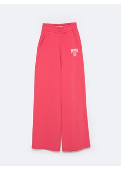 Spodnie dziewczęce dresowe z prostą nogawką różowe Longencja 601/ Georgina 601 ze sklepu Big Star w kategorii Spodnie dziewczęce - zdjęcie 169336818